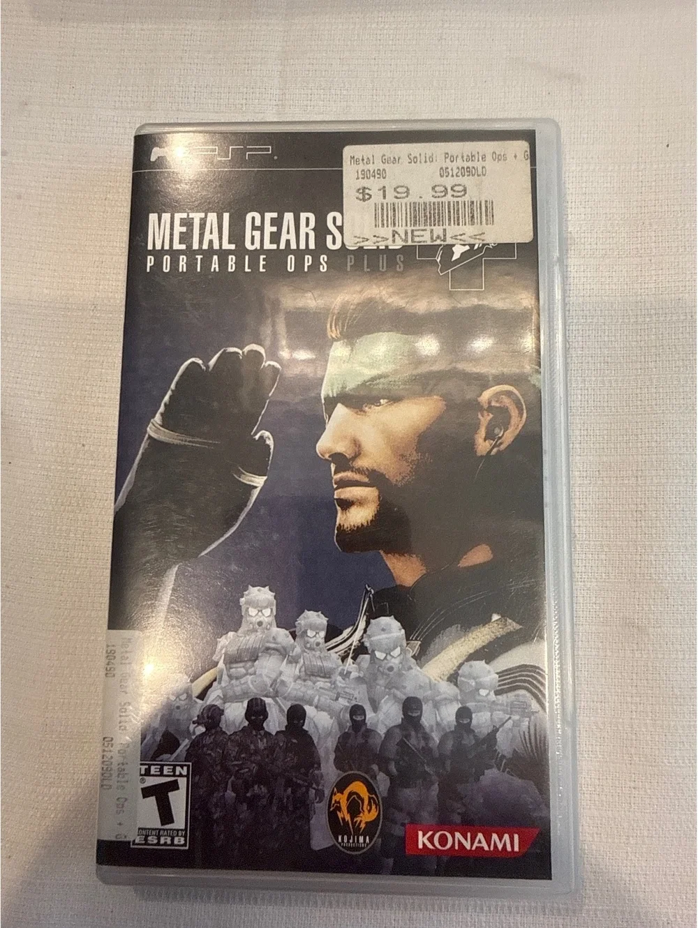 PSP Game Bundle - NFL Street 2 Unleashed, Metal Gear Solid Portable Ops Plus, &